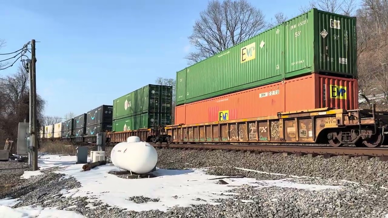 NS intermodal entering Harrisburg PA Terminal and meeting with Amtrak