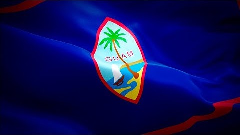Guam USA‎ flag video waving in wind. Realistic Micronesia Flag background. Guam flag Full HD