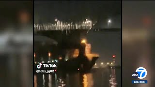 Moment Baltimore bridge collapsed and sent cars plunging into harbor