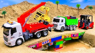 Rescue Police Car from the Hand in Cave with Construction Vehicles Fire Truck | ENJO Car Toys