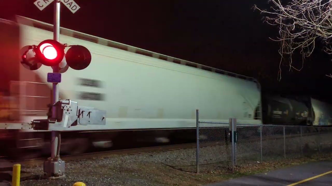 CSX M652 Through Downtown Lincolnton NC with a small bit of MOW equipment on it