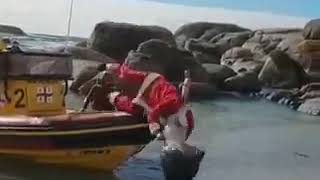 Santa Claus arrives at the Beach 🤣