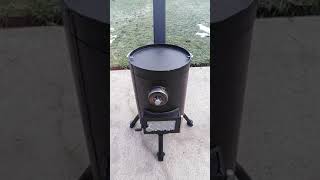 Wood stove from old excavator exhaust. Diy