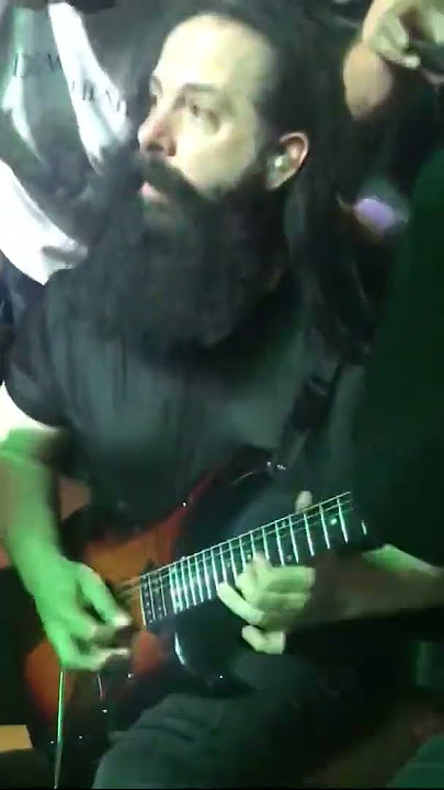 John Petrucci jumps into the crowd for a guitar solo!