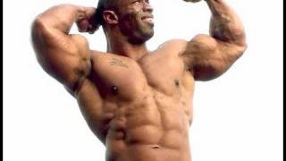 HD Muscle - Bodybuilder Cory Mathews posing outside Metroflex Gym