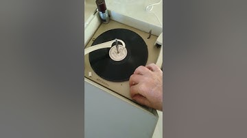 RCA Victor portable 4 speed automatic record player playing a 78 RPM record.