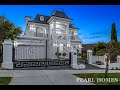 An opulent VERSACE inspired chateau by Pearl Homes - THE WHITEHOUSE