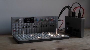 Monome Norns + Grid (MLR script) and Teenage Engineering OP-1