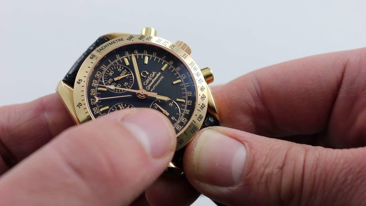 omega speedmaster triple date gold