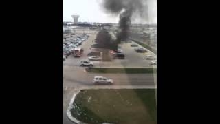 Car on fire at State Farm corporate south