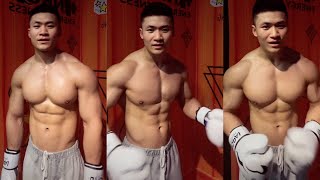muscular asian teen practicing boxing.
