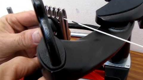 3) How to tighten up a clamp on a stringing machine