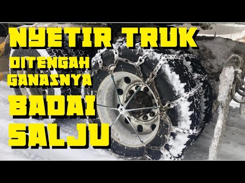 Video: Cara Menarik Trek Di Mobil Salju Buran