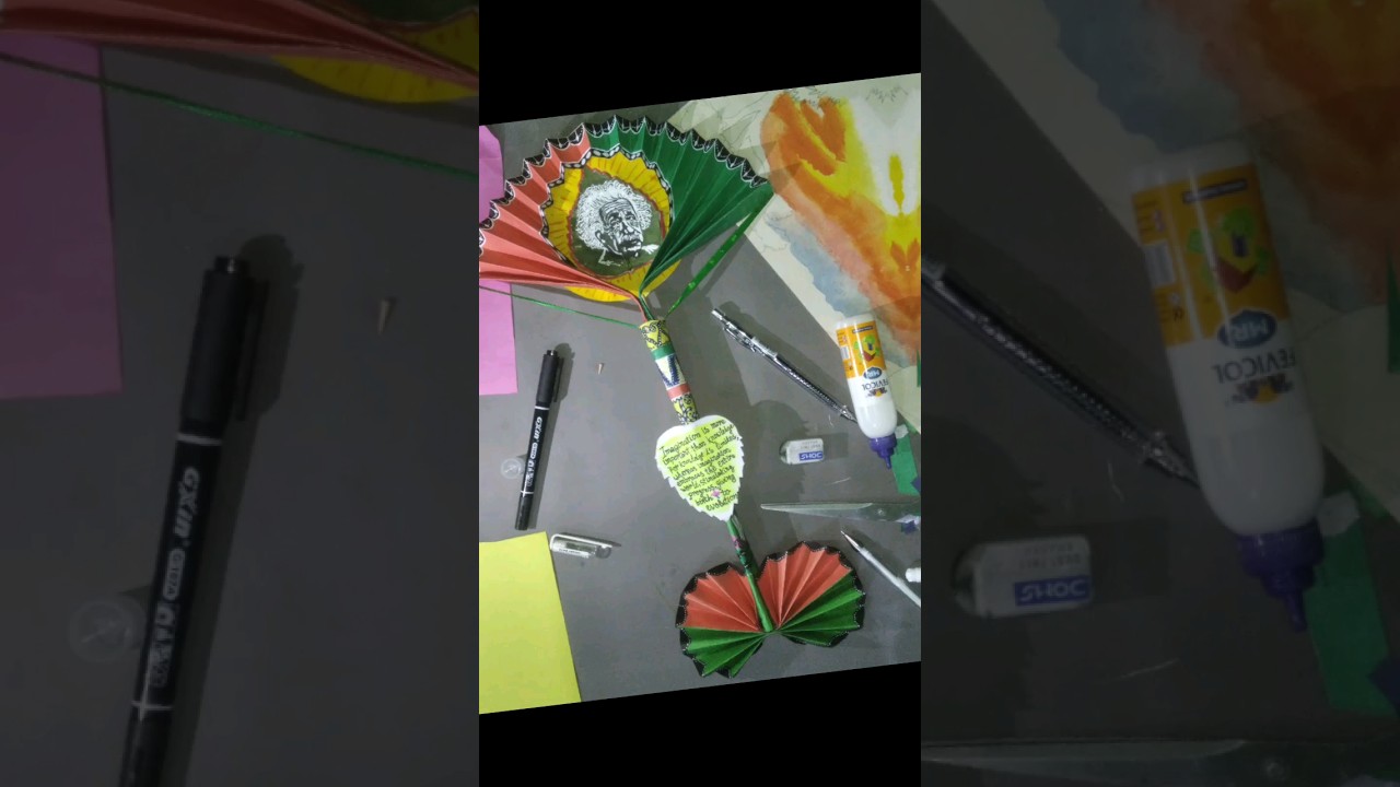 "Colourful Paper Fan with Albert Einstein Art in Leaf" 