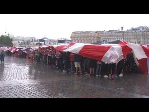 Croatian Fans Hide Under GIANT Flag During Heavy Rain In Moscow - Russia 2018 World Cup