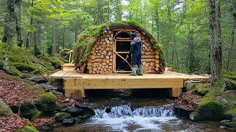 A Man Builds a Secret Shelter in the Forest Above the Stream