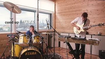 BATTLES performs "Titanium 2 Step" and "Fort Greene Park" Live in Brooklyn | Cued Up