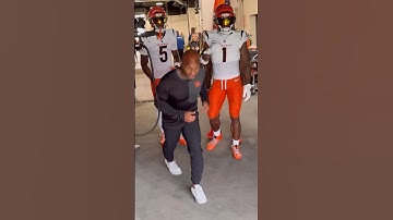Ja’Marr Chase and Tee Higgins lead Bengals receivers onto the field Monday night in Denver.