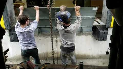 Hanging an EOD (Edge of Dock) #dockleveler #constructionlife #dockrepair