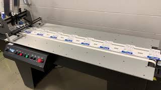 Streamfeeder's V1400IJ feeder and Vacuum Transport Conveyor