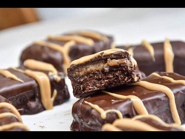 Delicious Dark Chocolate Bars filled with protein, peanut butter and soaked dates.
Oats, Cocoa powder, Marple syrup as sweetener, or you can use any other. 
For the recipe and all details of this amazing bars check :
www.olgicanacevakitchen.com
Enjoy :)


Music : bensound.com
