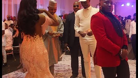 Too Much Money! Big Men Sprays Money On Ajebo Comedian And His Beautiful Bride On The Dance Floor