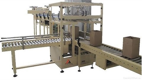 Drop-type carton packing machine with unpacking system