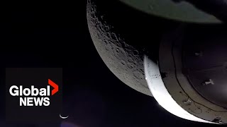 NASA's Artemis I captures moon surface, crescent Earth on return journey home