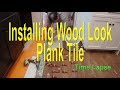 Wood look plank tile installation  on Schluter Ditra start to finish time lapse