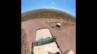 Driving through dust devils at Ngorongoro Crater and Conservation Area (square frame)
