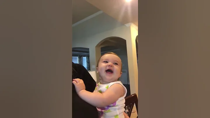 Baby laughing at fly swatter!!!