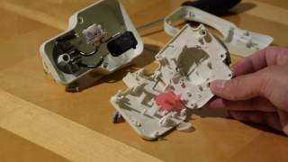 Cut open an analog timer, lots gears inside