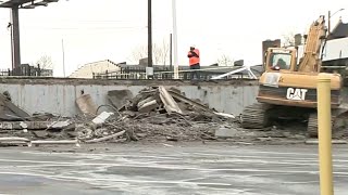 8 vehicles damaged in parking deck collapse