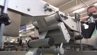 Labeling system for TOP&BASE application on food trays