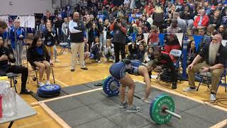 Arnold’s Emily Bennett completes a 185-pound clean and jerk to clinch a state title.