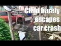 Child barely escapes car crash