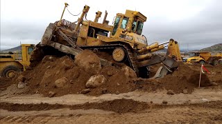 CAT D10N Dozer pushing dirt and rock - amazing power