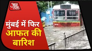Heavy Rain In Mumbai: कई इलाकों में देर रात से जारी है बारिश, जलजमाव से परेशान लोग