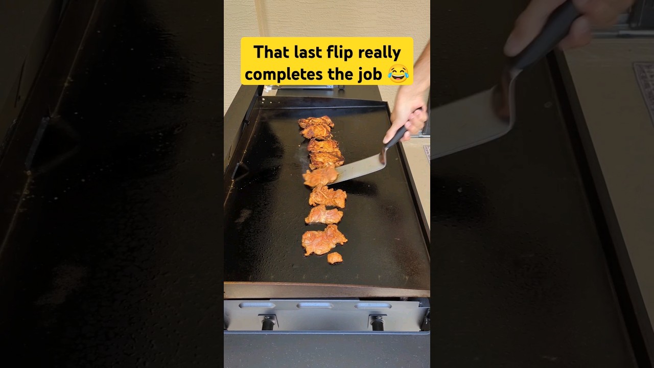 Cooking chicken thighs on a Blackstone, flipping the big pieces but not forgetting the little guys 😂