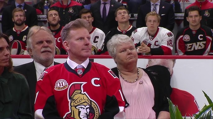 Chris Neil expresses tears of joy as Senators raise his number 25