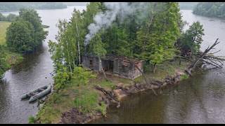thunderstorm and rain in an abandoned anglers shelter , catch and cook