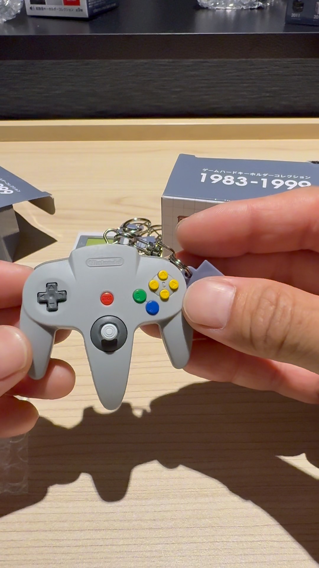 The keychain my coworker bought is way too cool #nintendo #museum