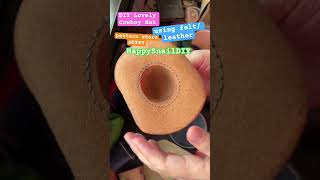 handmade a cowboy leather hat. Good for small toys or small pet.