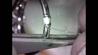 Laser resizing a platinum, diamond set ring