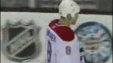 Mike Komisarek Hip Checks Milan Lucic