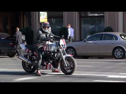 Man on a motorcycle, Biker riding motorcycle NEVSKY Prospekt St Petersburg Urban adrenaline rush