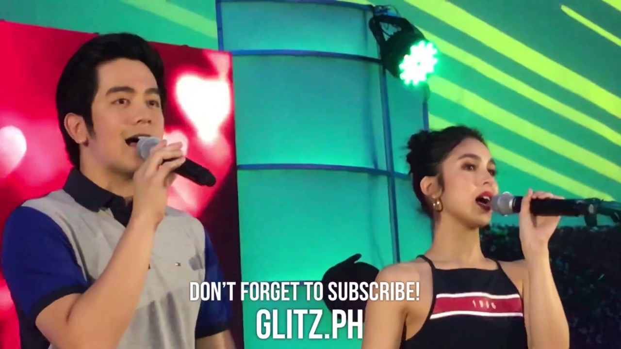 Julia Barretto cries as Joshua Garcia hugs her at the JoshLia Fan Meet Finale