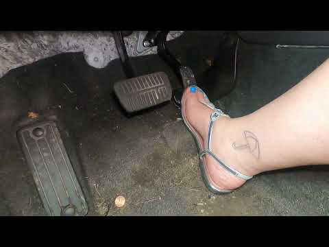 Driving In Silver Sandals
