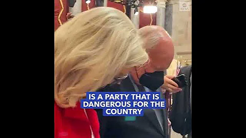 Rep. Liz Cheney leaves House chamber with her fath...