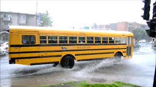MONTREAL CITY & SCHOOL BUSES DRIVING IN DOWNPOUR